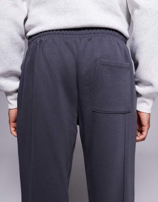 ASOS DESIGN tapered sweatpants with pin tucks in charcoal