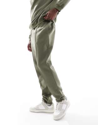 Asos Design Tapered Sweatpants With Pin Tucks In Green