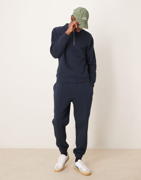 ASOS DESIGN tapered sweatpants with pin tucks in navy - part of a set - view 1