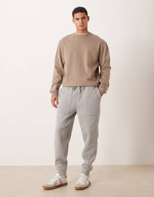 Asos Design Tapered Sweatpants With Pockets In Gray