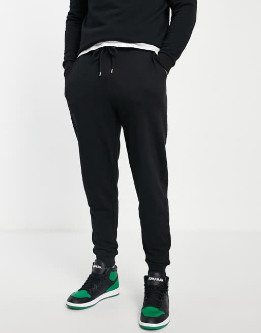 ASOS DESIGN tapered trackies in black (part of a set)
