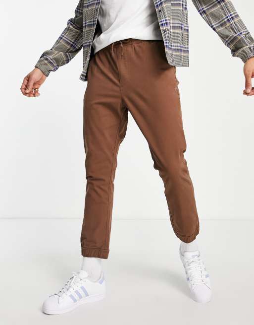 ASOS DESIGN tapered trackies in brown