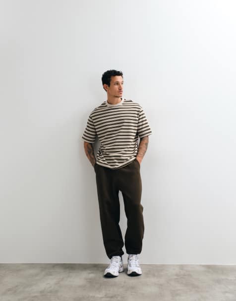 ASOS DESIGN tapered trackies in herringbone texture in brown - view 1