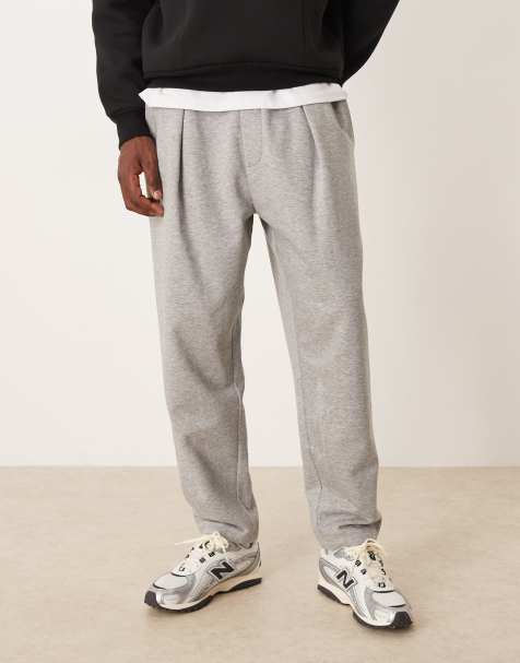ASOS DESIGN tapered trackies in light grey - view 1