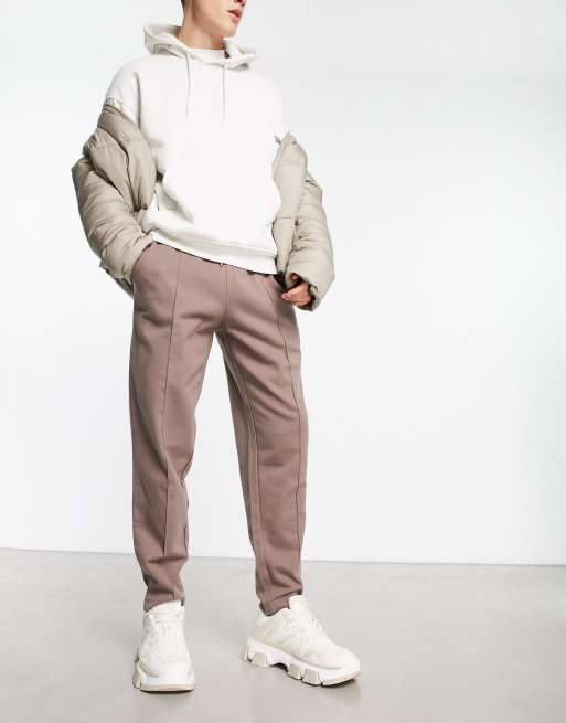 ASOS DESIGN tapered trackies with pintucks in brown | ASOS