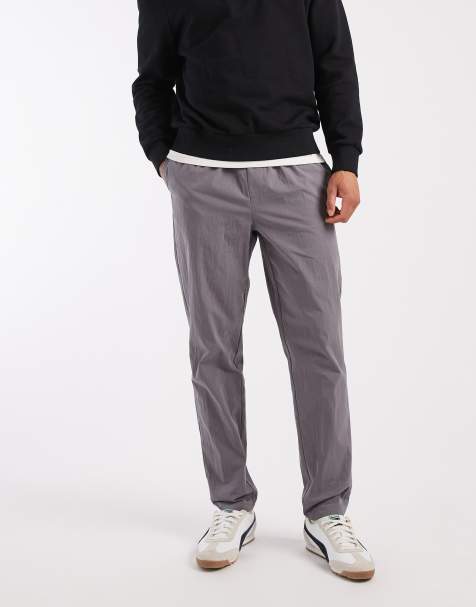 ASOS DESIGN tapered trousers in charcoal nylon with buckle - view 1