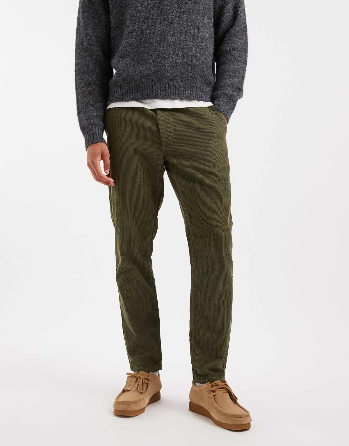 ASOS DESIGN tapered trousers in khaki corduroy