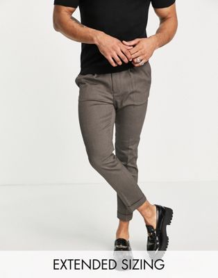 ASOS DESIGN tapered turnup smart trousers in textured camel with turn up