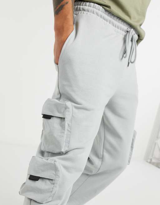 ASOS DESIGN two-piece cargo tech pants with 3D pockets in navy