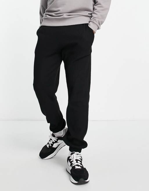 ASOS DESIGN tapered waffle trackies in black (part of a set)