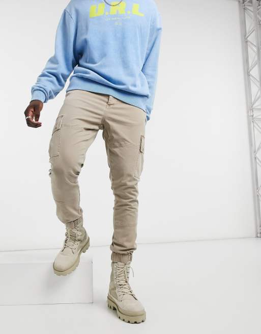 ASOS DESIGN tapered washed cargo pants in stone | ASOS