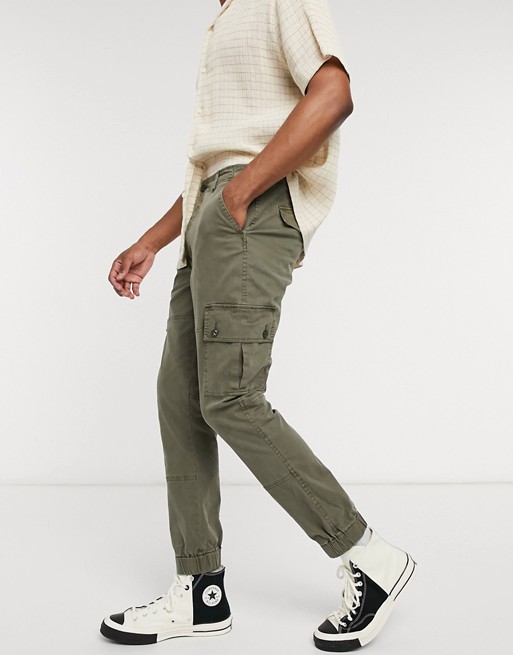 ASOS DESIGN tapered washed cargo trousers in khaki