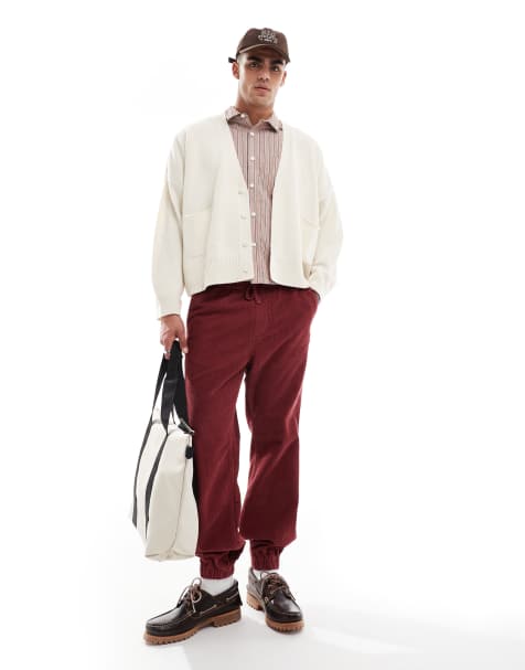 ASOS DESIGN tapered washed cord sweatpants in burgundy - view 1