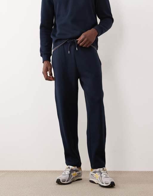 ASOS DESIGN - Taps toelopende joggingbroek in marineblauw, 2 van 5