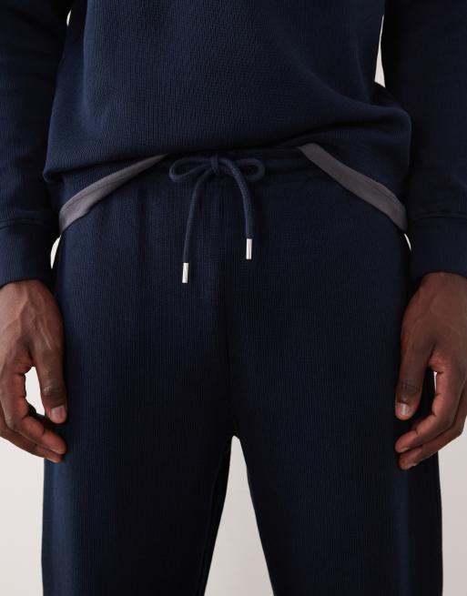ASOS DESIGN - Taps toelopende joggingbroek in marineblauw, 5 van 5