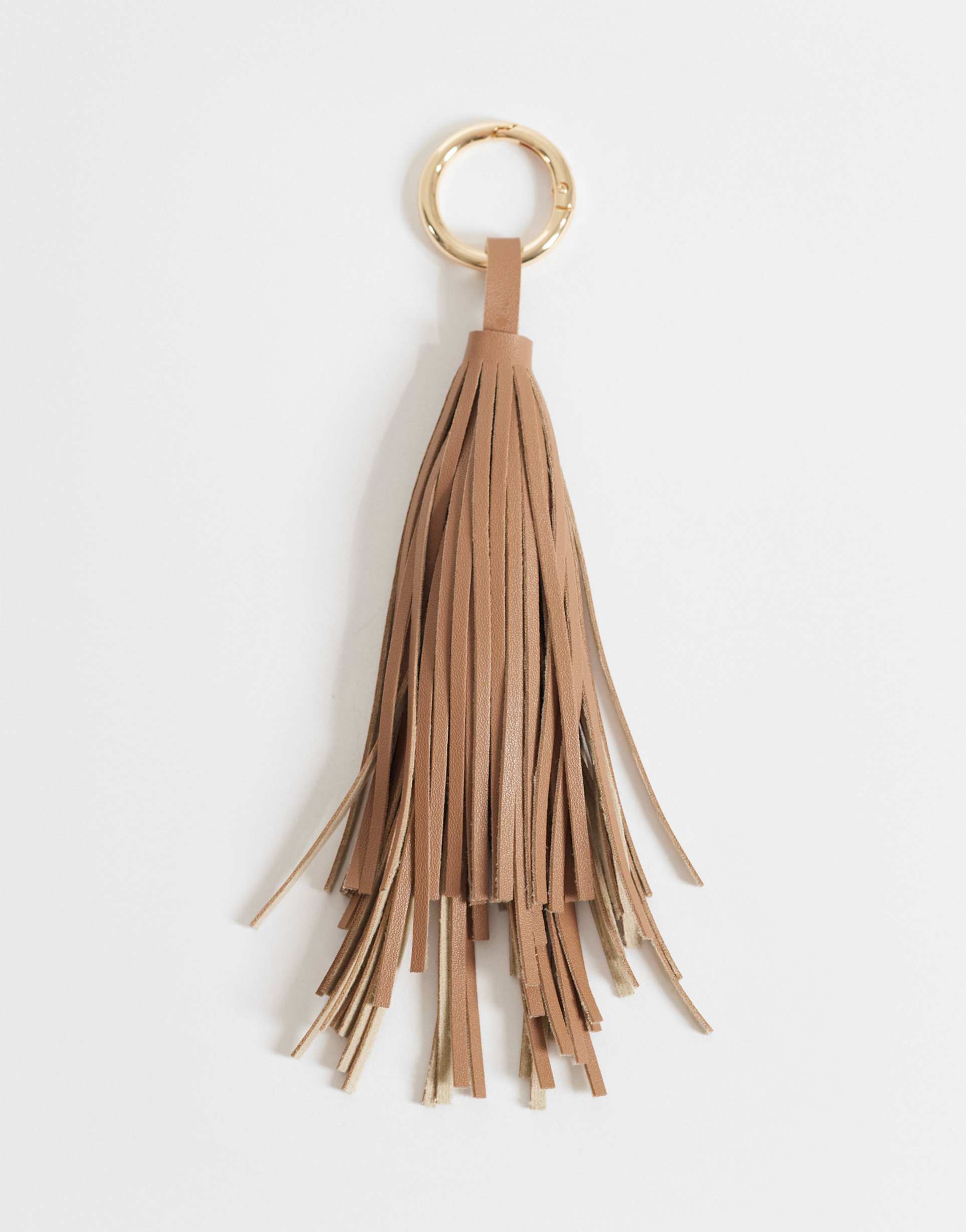 asos design tassel bag charm in light tan