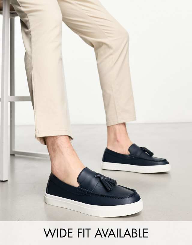 ASOS DESIGN Tassel loafers in navy faux leather with white sole