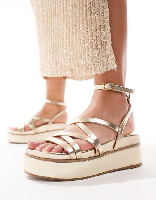 ASOS DESIGN Taurus 2 strappy flatform sandals in gold