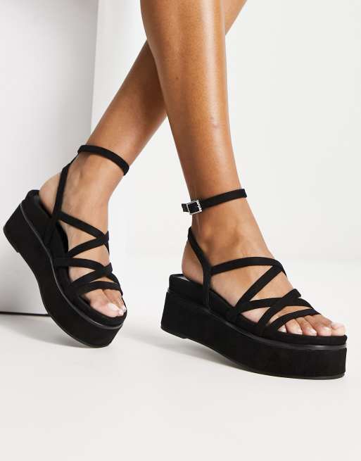 ASOS DESIGN Taurus Sandales semelle plateforme et lani res Noir