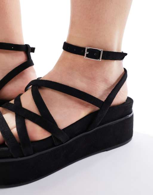 ASOS DESIGN - Taurus - Sandali a pianta larga neri con fascette sottili e  suola flatform