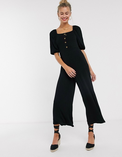 ASOS DESIGN tea jumpsuit with button front and puff sleeve in rib in black