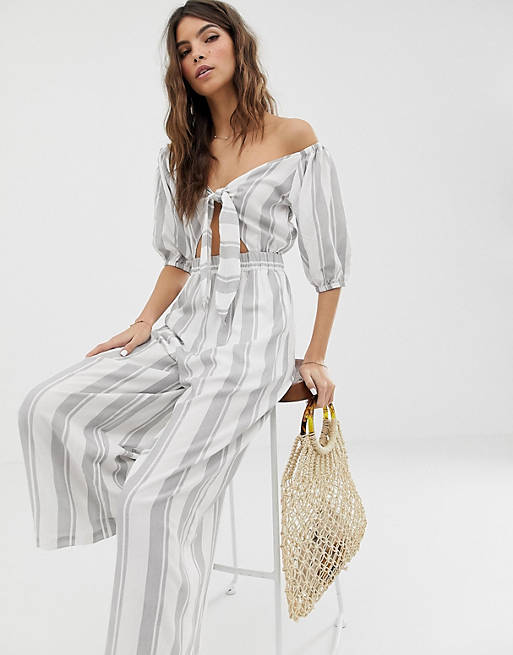 ASOS DESIGN tea jumpsuit with puff sleeve and tie detail in stripe print