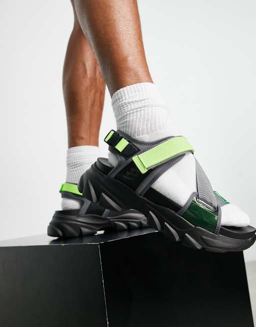 ASOS DESIGN tech sandals in black and neon green on chunky sole ASOS