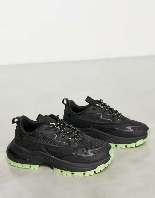 ASOS DESIGN tech sneakers in black with green details