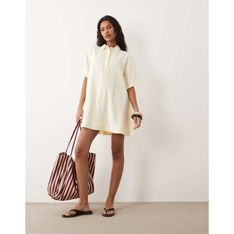 yellow short sleeve dress Short-Sleeve Polo Midi Hand wash cold and lay flat to dry for optimal care Yellow Short Sleeve Button Down
