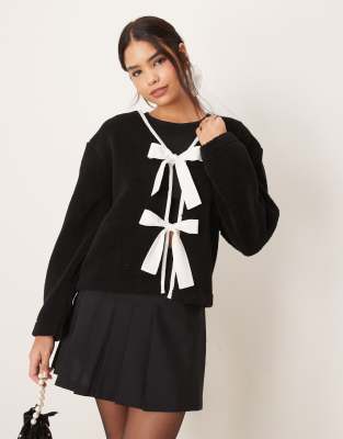 ASOS DESIGN – Teddyfell-Jacke in Schwarz mit Schleifendetails - view 1