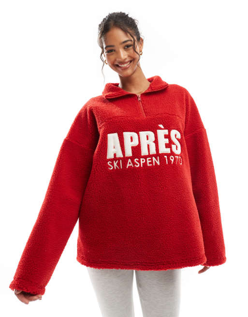 ASOS DESIGN – Teddyfell-Sweatshirt in Rot mit „Apres Ski“-Grafikprint