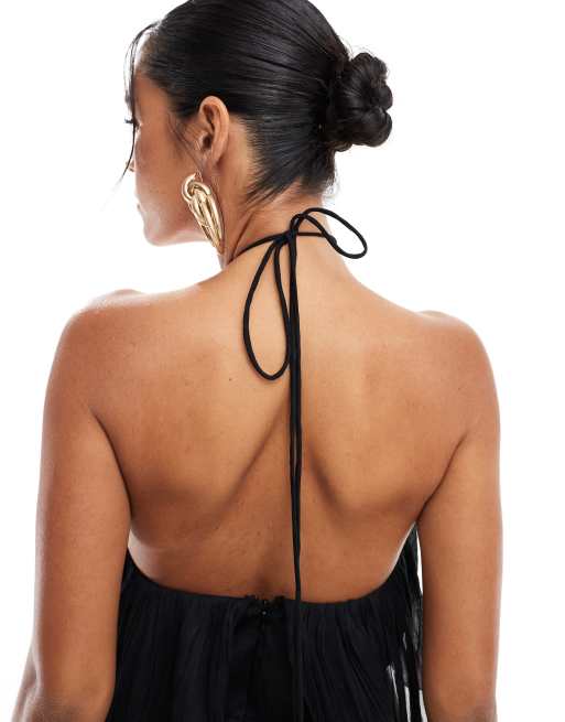 ASOS DESIGN - Tekstureret og sort jumpsuit med halterneck, brede ben og flæsedetaljer, 2 af 4