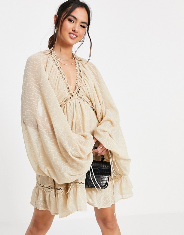  Online ASOS DESIGN – Teksturowana luźna sukienka midi z obszernymi rękawami z obcisłym mankietem, w kolorze kamiennego beżu Kamiennobeżowy
