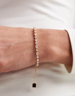 ASOS DESIGN tennis bracelet with cubic zirconia stone details in gold tone in gift bag