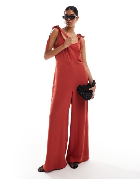 ASOS DESIGN - Terrakottafarvet jumpsuit med dyb og rund hals samt ben med vidde og bindedetaljer i cupro - view 1