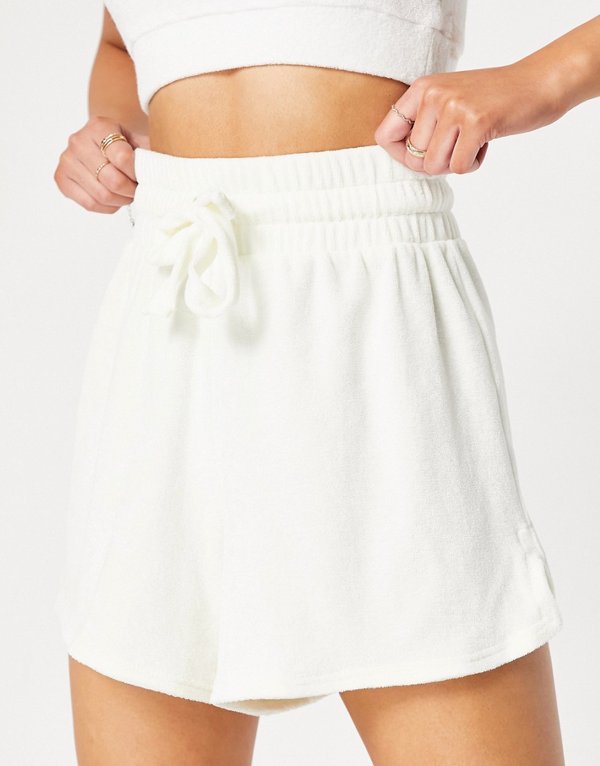 ASOS DESIGN terrycloth beach shorts in ivory-White