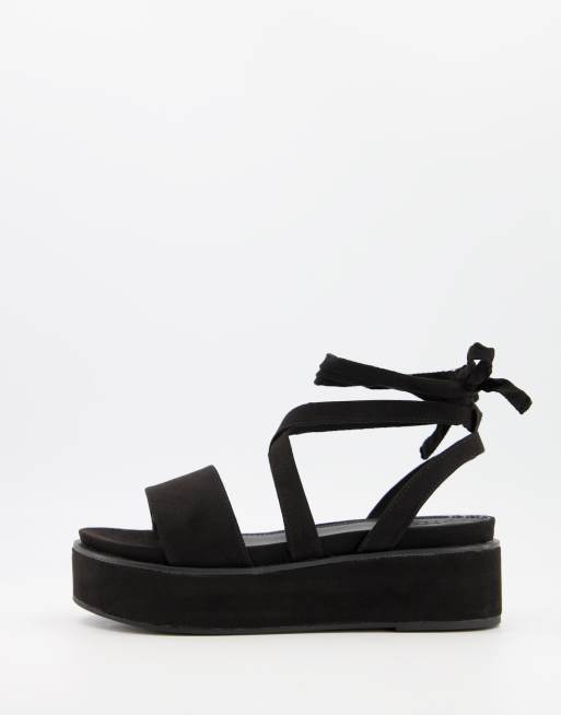 ASOS DESIGN - Tessa - Sorte flatform-sandaler med bindebånd om benet