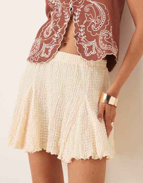 ASOS DESIGN texture godet mini skirt in ivory - view 1