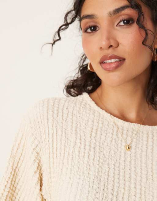 ASOS DESIGN textured asymmetric cinched t-shirt in buttermilk