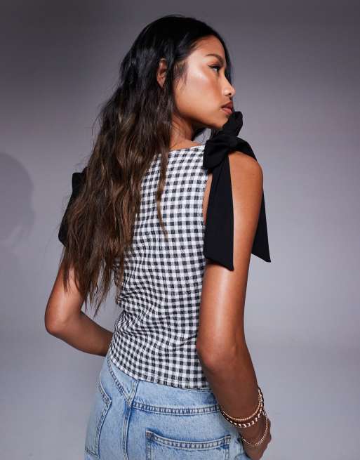 ASOS DESIGN textured black bow shoulder top in gingham print