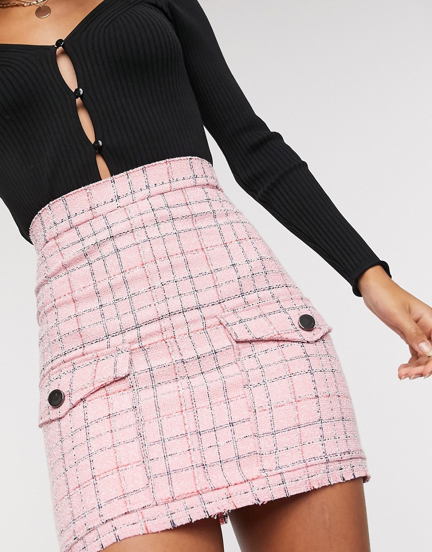 ASOS DESIGN textured boucle mini skirt with check design in pink-Multi