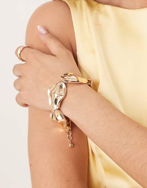 ASOS DESIGN textured chunky bracelet in gold tone - view 1