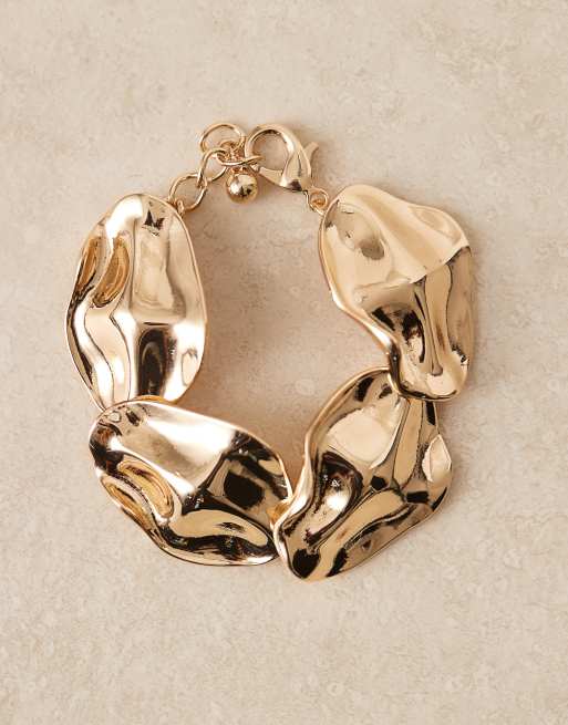 ASOS DESIGN textured chunky bracelet in gold tone