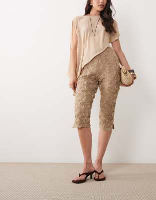 ASOS DESIGN textured floral 3/4 length pants in natural