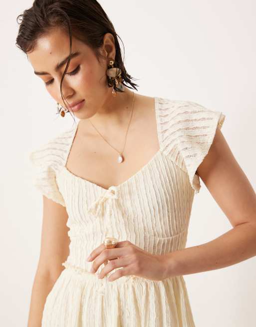 ASOS DESIGN textured flutter sleeve mini dress in ivory