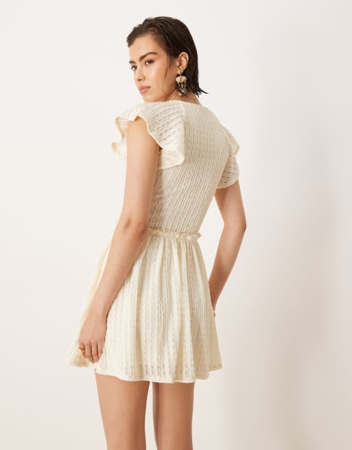 ASOS DESIGN textured flutter sleeve mini dress in ivory