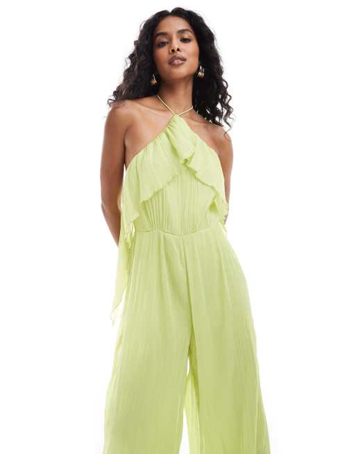 ASOS DESIGN textured halter wide leg jumpsuit with frill detail in lime green