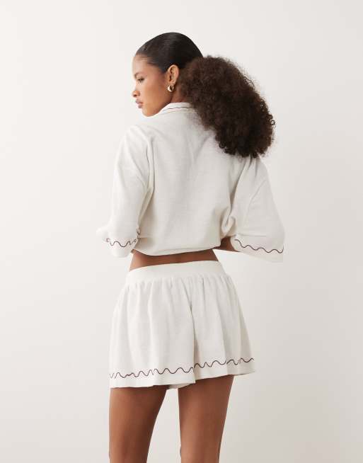 ASOS DESIGN textured jersey short co-ord with burgundy embroidery in cream, 3 of 5