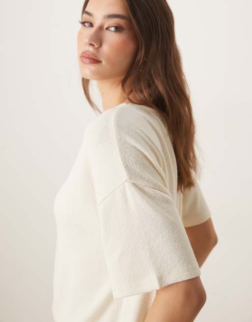 ASOS DESIGN textured knit handkerchief hem tee in cream 