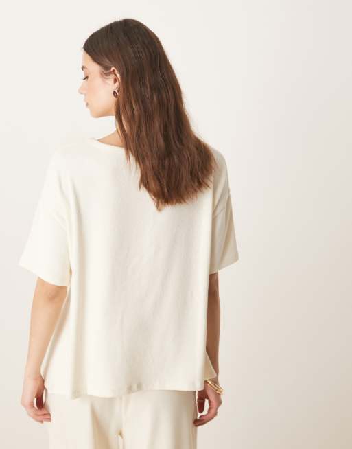 ASOS DESIGN textured knit handkerchief hem tee in cream 